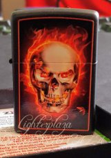 ZH0005568 Zippo lighter Burning Skull - Black matte Finish.